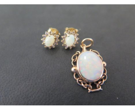 A pair of 9ct gold opal and diamond cluster earrings - Hallmarked London - Together with a 9ct gold opal pendant - Hallmarked