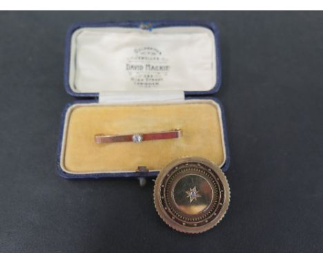 An early 20th century 9ct gold old-cut diamond bar brooch - Together with a circular memorial brooch with rose-cut diamond de