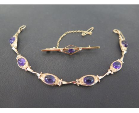 A 9ct gold amethyst cabochon panel bracelet - Hallmarked London - Length 19cms - Together with an amethyst and seed pearl bar