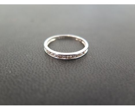 A brilliant-cut diamond half-circle ring - Stamped plat - Ring size N - Weight approx 2.1gms
Condition Report: Good to fair -