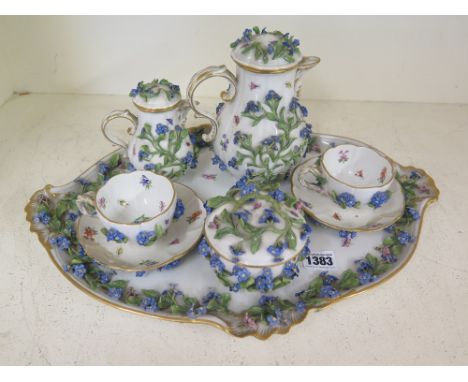 A Meissen outside decorated cabaret set comprising: tray, coffee pot, sucrier, jug, two cups and saucers 
Condition report:  