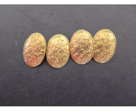 A pair of late Victorian 15ct gold cufflinks - With scroll and foliate detail - Hallmarked Birmingham, 1891 - Weight approx 5