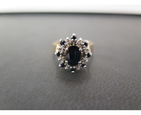 A 9ct gold sapphire and diamond snowflake cluster ring - Hallmarked London - Ring size M - Weight approx 4.1gms
Condition Rep