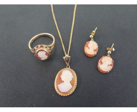 A group of shell cameo jewellery - To include a ring, size N - A pair of ear pendants - Length 1.8cms - Together with a penda