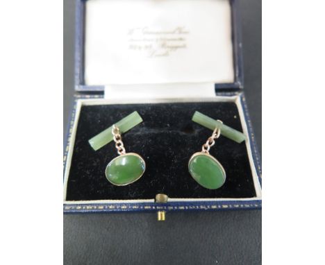 A pair of nephrite jade cufflinks - Stamped 9ct - Weight approx 4.8gms 
Condition Report: Good