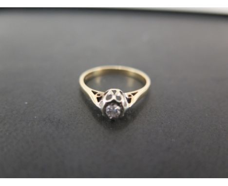 A 9ct gold diamond single-stone ring - The brilliant-cut diamond within a collet setting - Hallmarked Birmingham - Ring size 