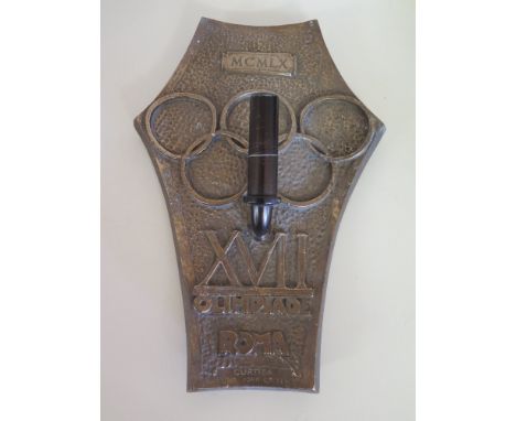 An interesting bronzed metal presentation plaque from the 1960 Rome Olympics - XVII Olimpiade Roma - 29 cm x 20 cm 
Condition