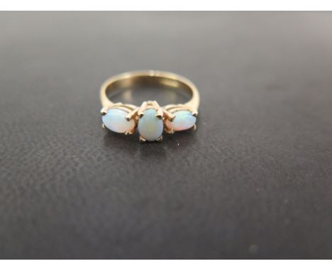 A 9ct gold opal three-stone ring - Hallmarked Birmingham - Ring size N - Weight approx 2.6gms
Condition Report: Good - With l