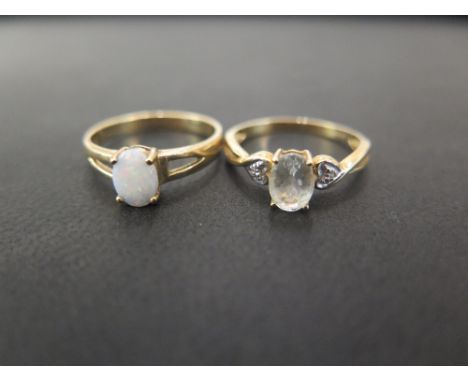 A 9ct gold aquamarine and diamond dress ring - Together with an opal single-stone ring - Both size N - Hallmarked Birmingham 