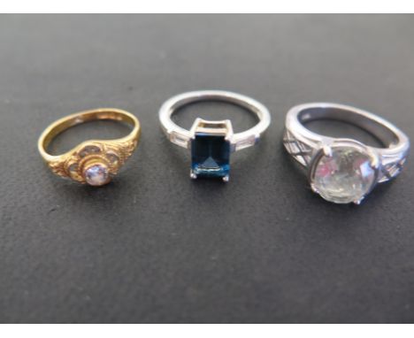 Three gem-set rings - All with marks indicating silver - Ring sizes I 1/2, N and N 1/2 - Total weight approx 9.4gms
Condition