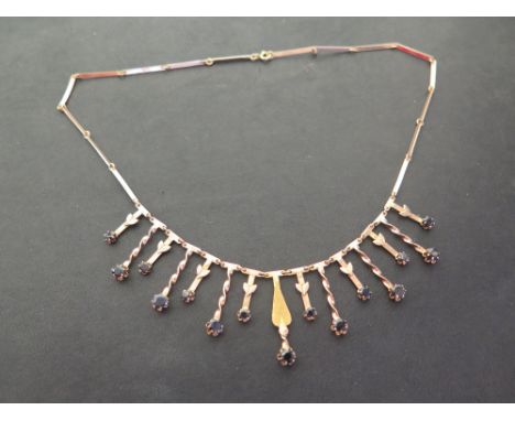 A sapphire fringe-style necklace - Stamped 14c - Length 46cms - Weight approx 14.2gms
Condition Report: Good to fair - With l