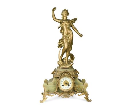 A Continental gilt metal and onyx mantel clock, late 19th century,  surmounted with an Art Nouveau maiden, raised on scroll f