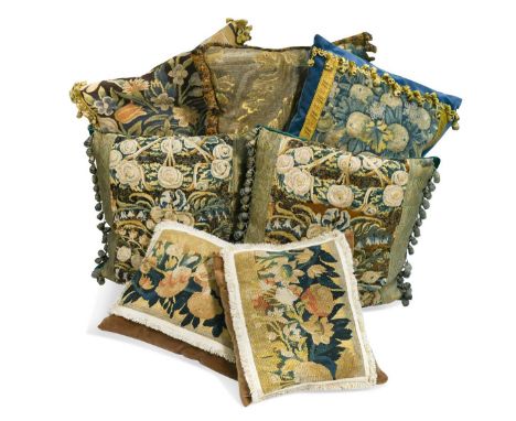 A collection of verdure tapestry cushions, including two pairs and all incorporating 17th/18th century tapestry fragmentsthe 