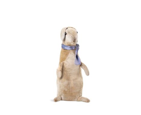 Steiff, Peter Rabbit, 1902-03, the velvet rabbit with black boot buttons, stitched V-shape nose and arms26.5cm highProvenance