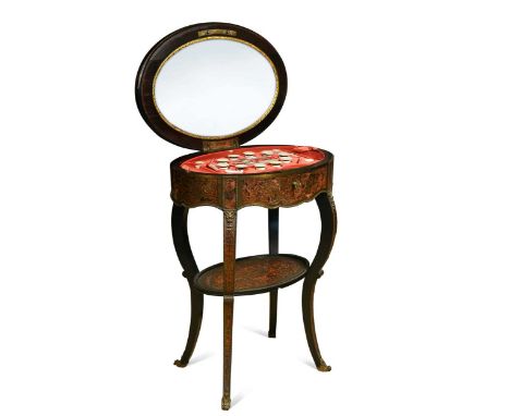 An oval tortoiseshell and brass Boulle marquetry ebonised work table, 19th century,  the interior fitted with mother-of-pearl