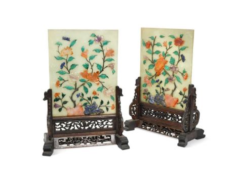 A pair of Chinese hardstone inlaid jade table screens, late Qing Dynasty,  decorated with blossoming peonies, on carved and p