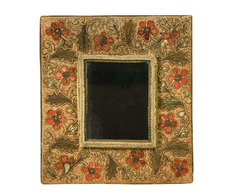 A rectangular tapestry covered wall mirror, 18th century and later, the frame decorated with stylised garnet-coloured flowers