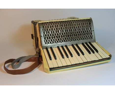 A Hohner 12 button piano accordion
