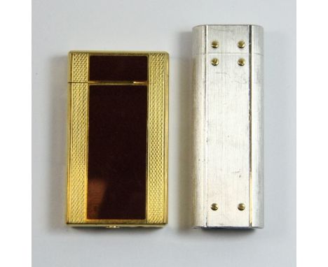 A Cartier lighter and a Corona lighter