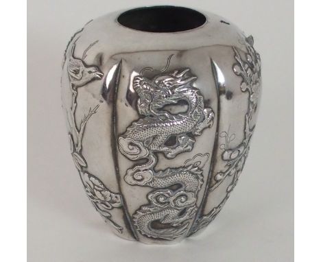 A CHINESE EXPORT SILVER LOBED VASE decorated with a dragon ,bird, irises, chrysanthemum, bamboo and blossom ,stamped WH Wang 