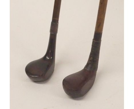 TWO VINTAGE GOLF CLUB WALKING STICKS one stamped T. R. Fernie, Turnberry, the other with silver collar (2) Condition Report: 