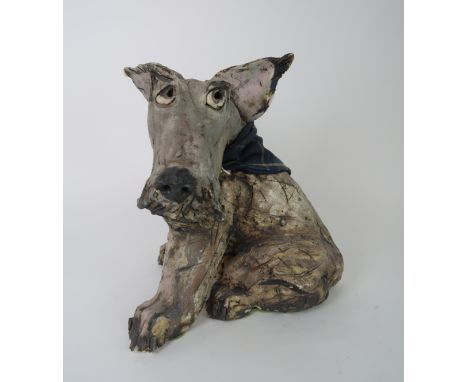 OLIVIA BROWN - A CERAMIC SCULPTURE OF A TERRIER CROSS with neckerchief, 30cm high Provenance: The Late Dr Helen. E. C. Cargil