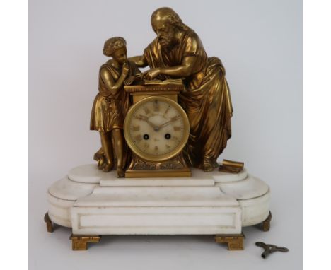 A LATE 19TH CENTURY FRENCH MANTLE CLOCK the alabaster base with gilded scholar and child studying books, resting on an alabas