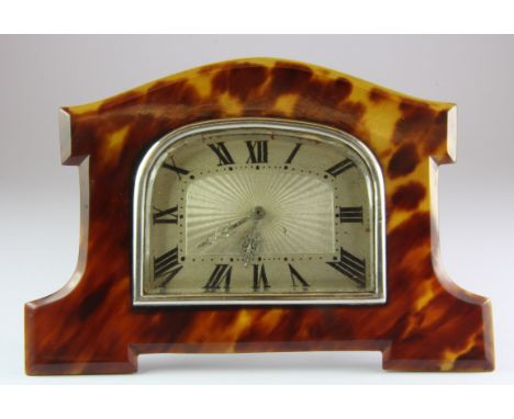 A 1920's tortoise shell framed mantle clock, W. 13.5cm.