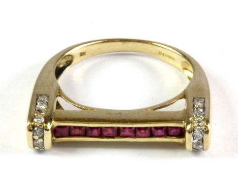 A 9ct yellow gold ruby and diamond set ring, (O).