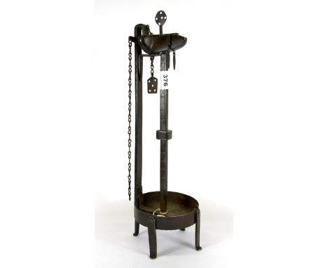 An early 19th Century German/ Austrian iron crusie lamp (see P.214, Caspal fire and light in the house pre 1820), H. 50cm. Pr