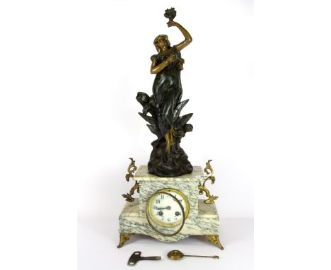 A French Art Nouveau spelter and marble figural mantle clock, H. 54cm.