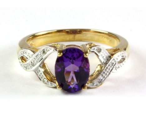 A 9ct yellow gold amethyst and diamond set ring, (M).