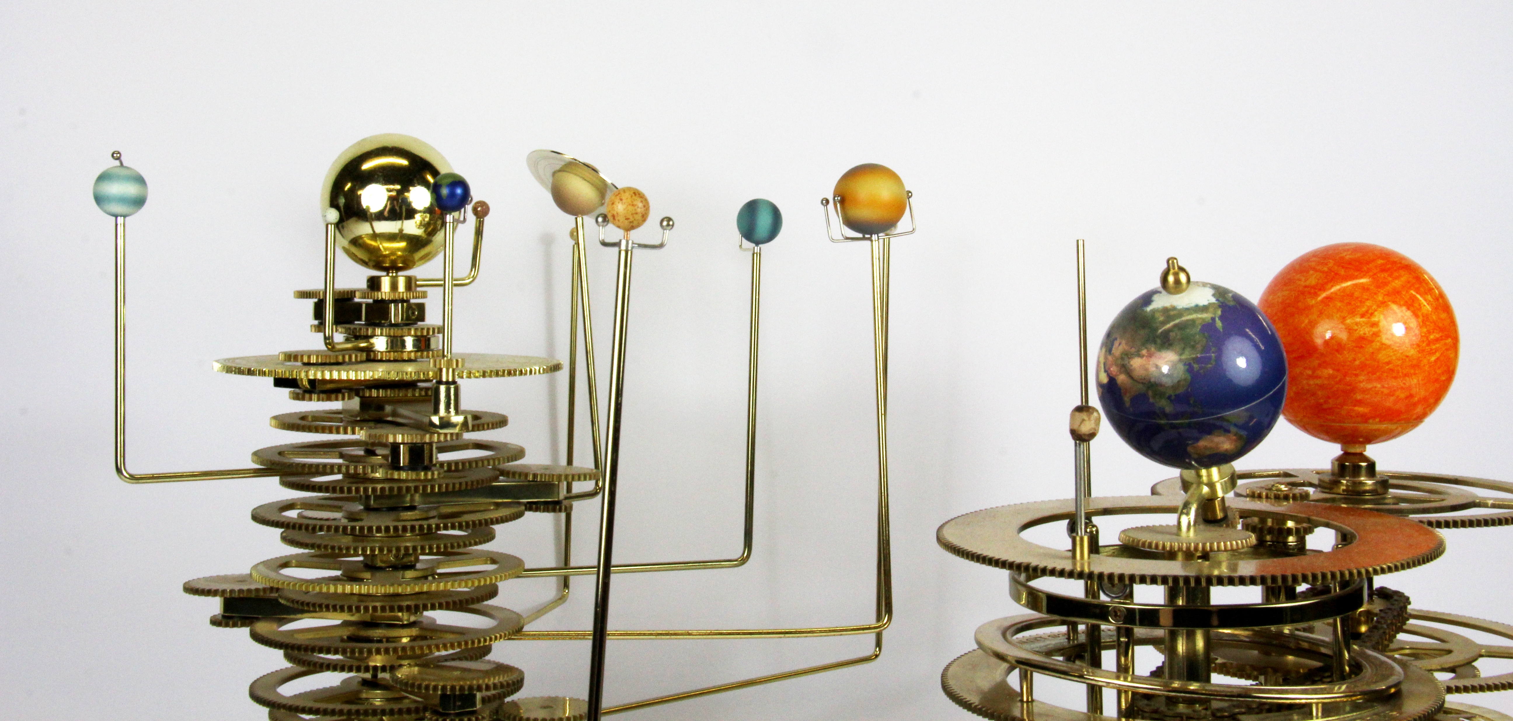 Two contemporary electric orrery, one of the solar system the other of ...