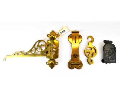 A 19th Century brass oil lamp bracket, together with a brass puzzle hasp and door knocker. Prov. Bynon Estate.