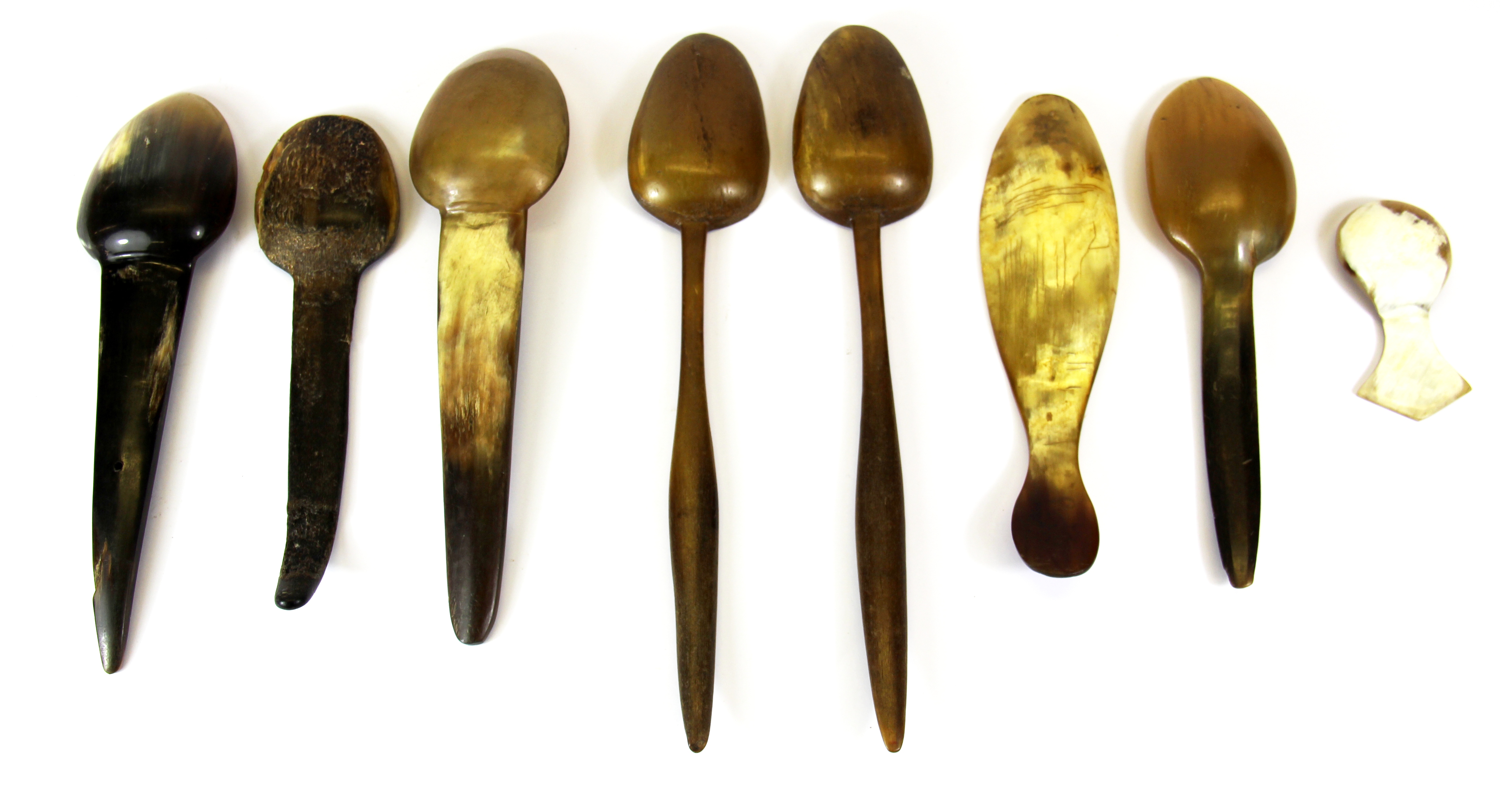 A group of eight early carved horn spoons (18th19th Century), longest