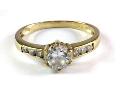 A 9ct yellow gold stone set ring, (O.5).