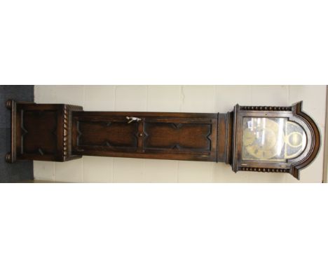 An early 20th Century brass dial oak longcase clock with chiming movement, W. 42cm, H. 189cm, (understood to be in w/o).