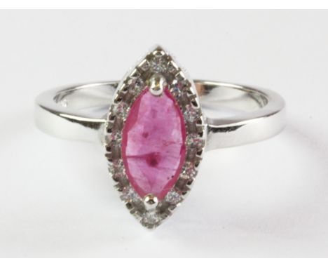 A 925 silver cluster ring set with a marquise cut ruby and white stones, (N.5).