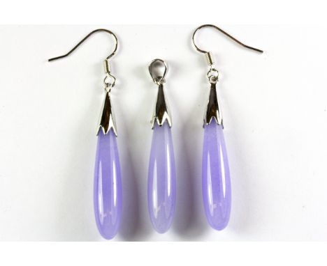 A white metal mounted lavender jade pendant and matching pair of earrings.