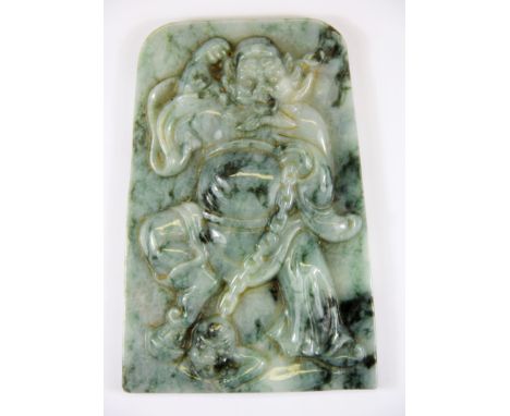 A superb Chinese carved jadeite jade panel (probably from a piece of furniture) depicting an underworld guardian with a 'sinn