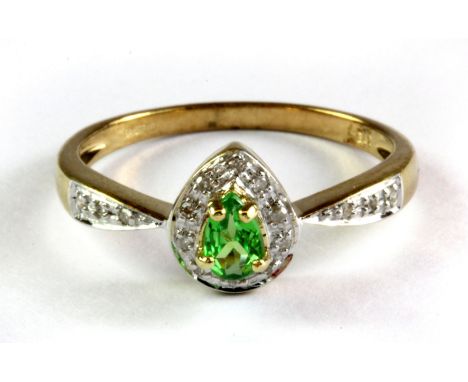 A 9ct yellow gold tsavorite and diamond set cluster ring, (M.5).