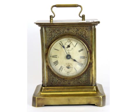 An Edwardian chiming brass alarm clock, H. 16cm.