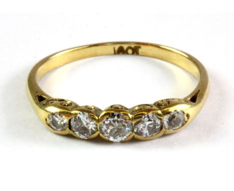 An 18ct yellow gold five diamond set ring, (N),