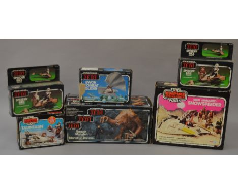 6 Vintage Star Wars boxed vehicles etc including Snowspeeder; Rancor; Ewok Glider; Tauntaun and 2 Speeder Bikes.