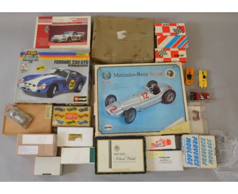 Good quantity of assorted model kit spare parts and boxes together with 3 part built car kits including Revival Cars Mercedes