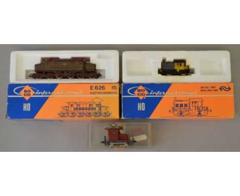 H0 scale. 3 x locomotives. Roco 4153B 0-4-0 shunter (missing buffer heads), Roco 4187A  electric pantograph locomotive, brown