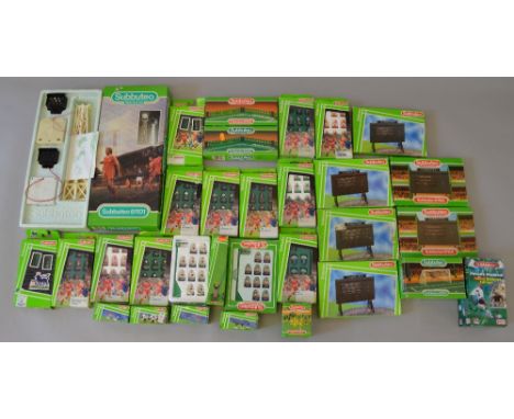 Subbuteo 14 boxed 80s/90s teams, together with a good quantity of boxed accessories including Scoreboards and Floodlights.