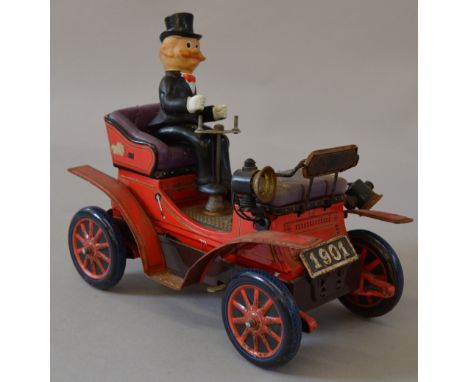 Japanese tinplate battery operated novelty vintage car. Overall F one headlight detached.