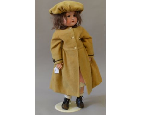 Late 19th/Early 20th century Kammer & Reinhardt bisque head girl doll, fully jointed with sleeping eyes. Height: approx 70cm.