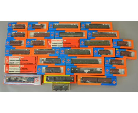 H0 Scale. 30 x boxed rolling stock by Roco, Fleischmann etc. Includes German DB coaches, DB hopper wagons, breakdown cranes. 